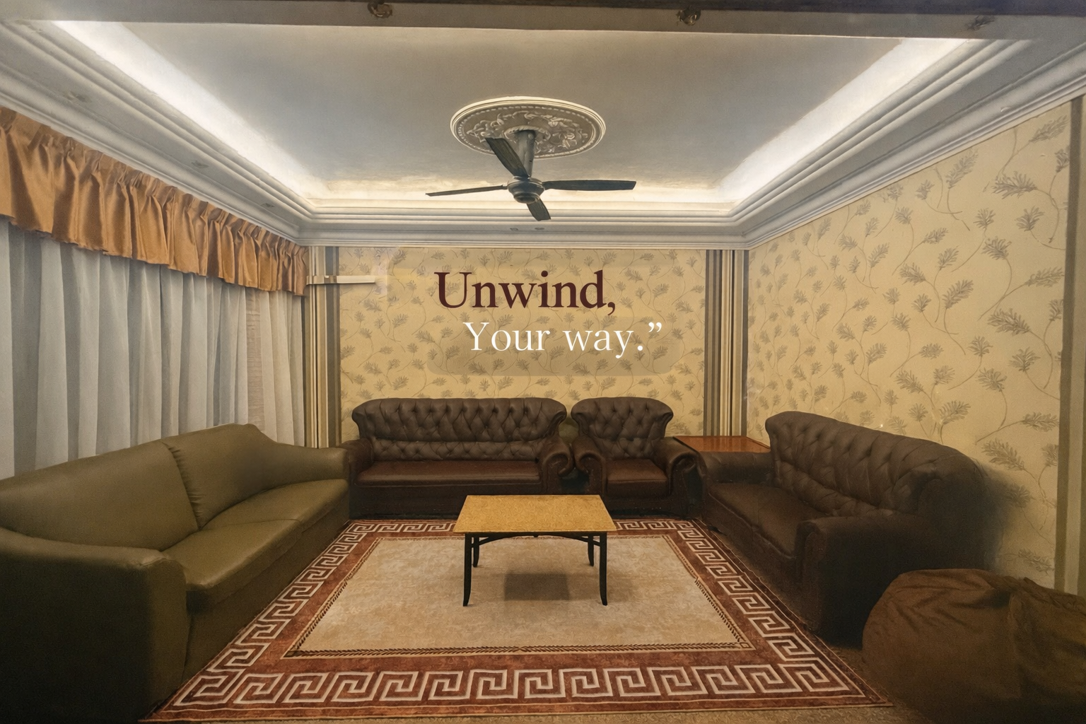 Villa Rinting lounge with sofas and warm lighting